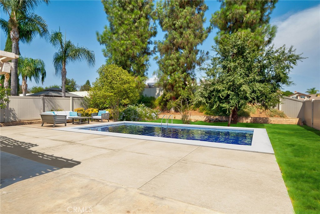 9376 Ruby Red Court Riverside, CA 92508 - Photo 5 of 54 a view of a yard with palm tree