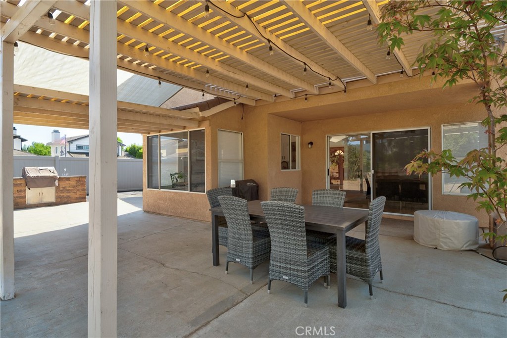 9376 Ruby Red Court Riverside, CA 92508 - Photo 53 of 54 a view of a dining room with furniture window and outside view