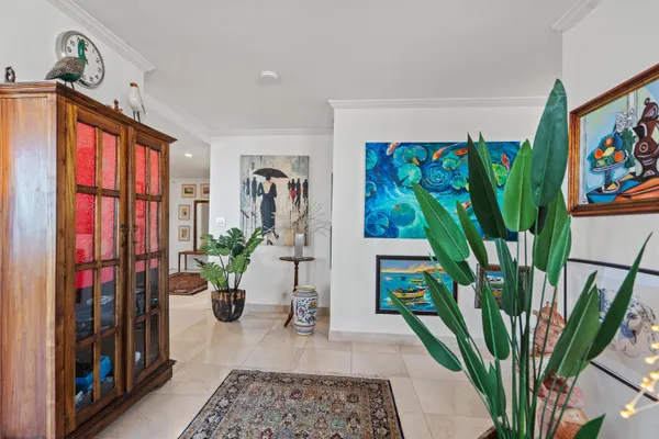 a view of a living room and a entryway