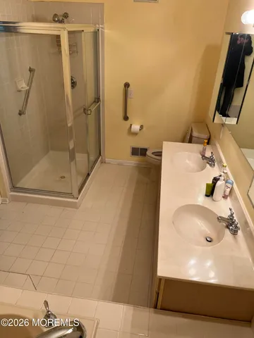 a bathroom with a tub and a sink