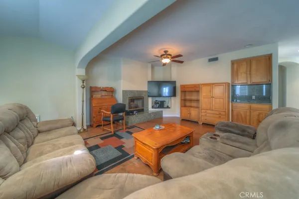 a living room with furniture and a window