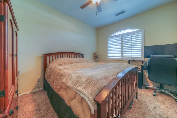 a bathroom with a sink a toilet and a shower