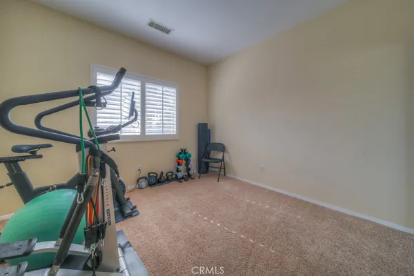 a bedroom with a bed and furniture