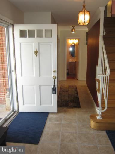 700 Pebblestone Court Silver Spring, MD 20905 - Photo 19 of 30 Bright entry with full view storm door.