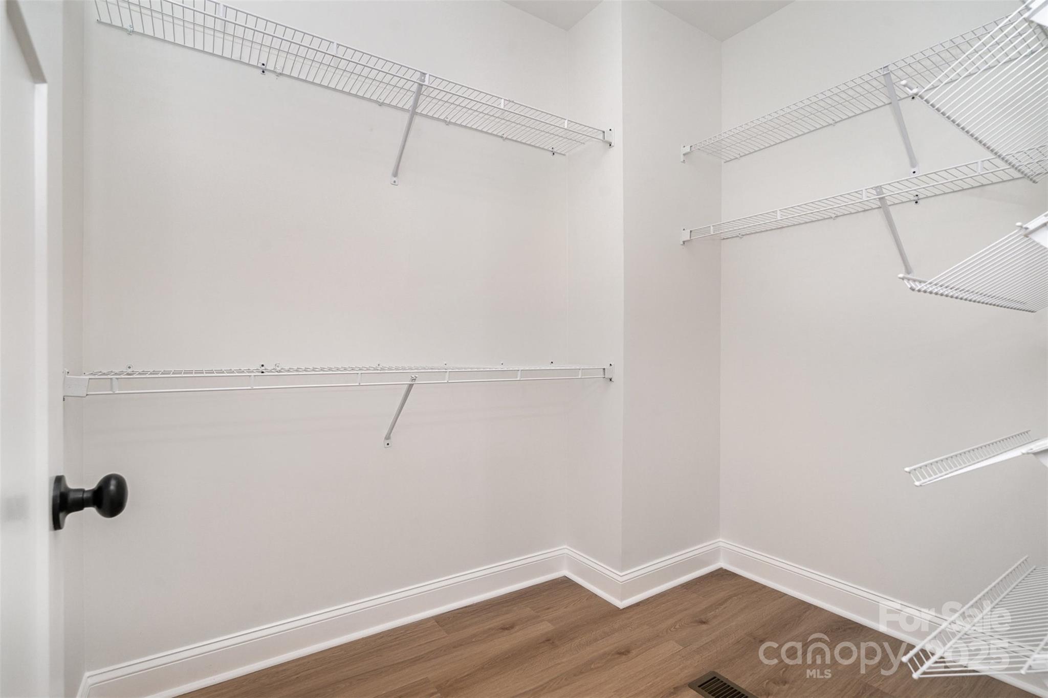 206 Autumn Blaze Road China Grove, NC 28023 - Photo 10 of 12 a view of a room with racks on the wall