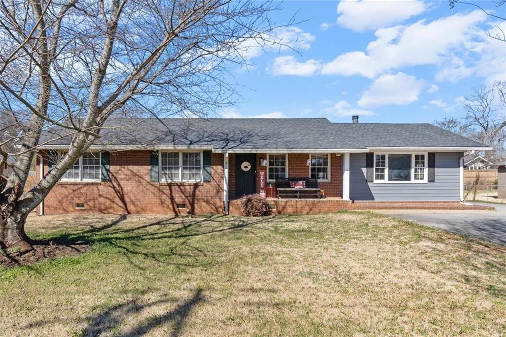 213 Cook Street Cartersville, GA 30120 - Photo 1 of 45 a view of a house with backyard