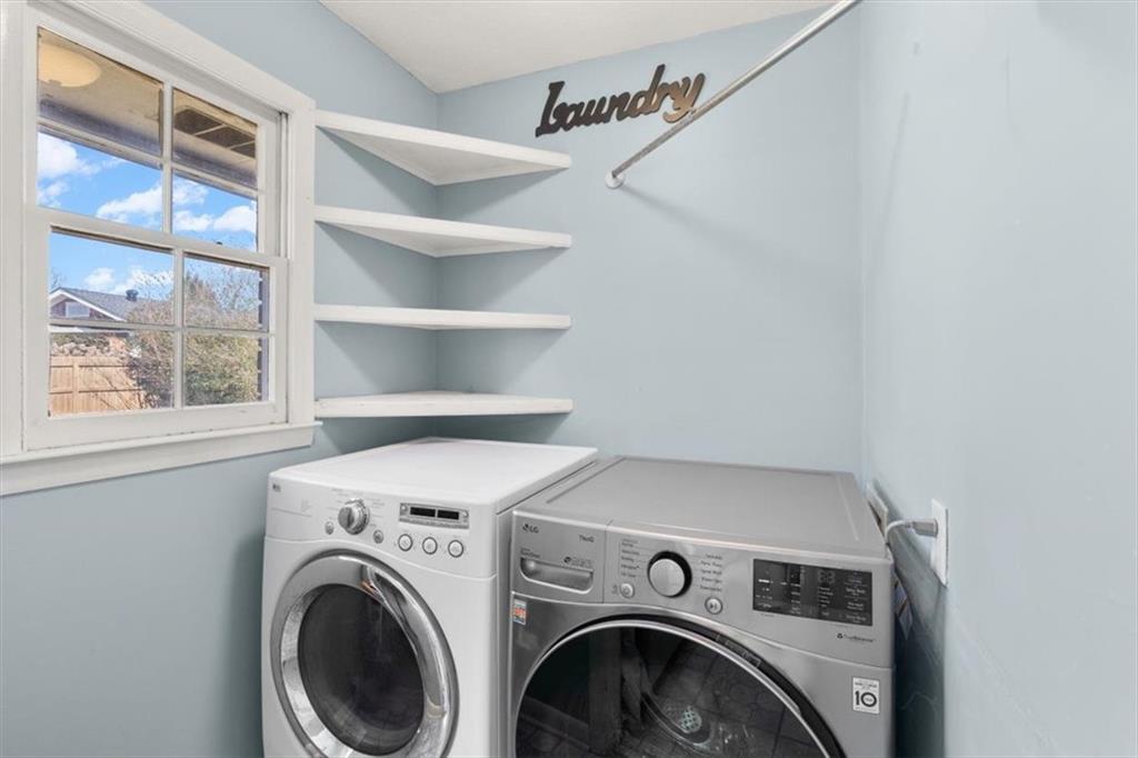 213 Cook Street Cartersville, GA 30120 - Photo 14 of 45 a view of storage and utility room with washer and dryer
