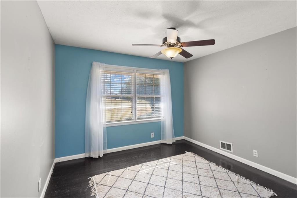 213 Cook Street Cartersville, GA 30120 - Photo 19 of 45 a view of an empty room with a window