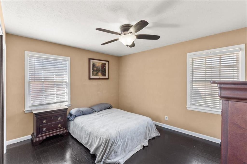 213 Cook Street Cartersville, GA 30120 - Photo 20 of 45 a bedroom with a bed and a window
