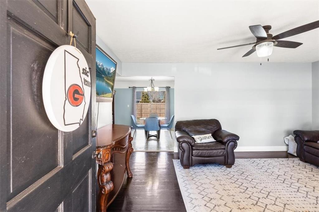 213 Cook Street Cartersville, GA 30120 - Photo 2 of 45 a living room with furniture and a rug