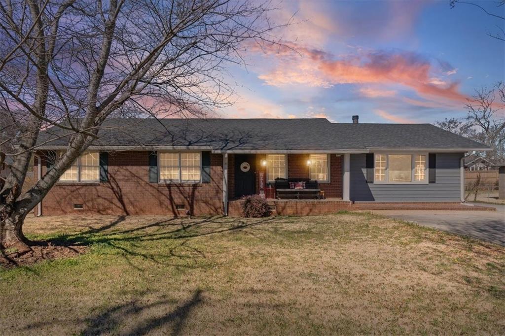 213 Cook Street Cartersville, GA 30120 - Photo 26 of 45 a view of a house with backyard