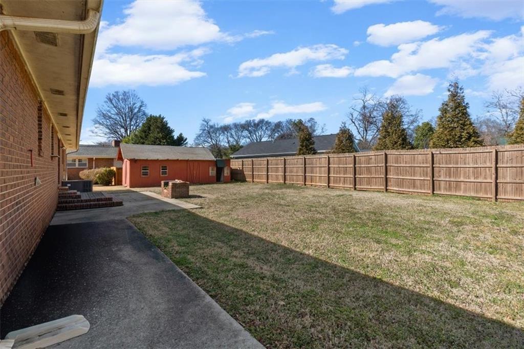 213 Cook Street Cartersville, GA 30120 - Photo 33 of 45 a view of backyard with outdoor seating