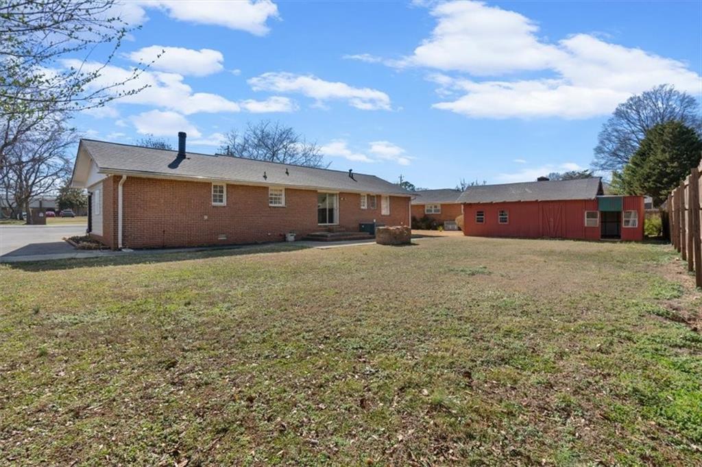 213 Cook Street Cartersville, GA 30120 - Photo 37 of 45 a view of a yard with a house