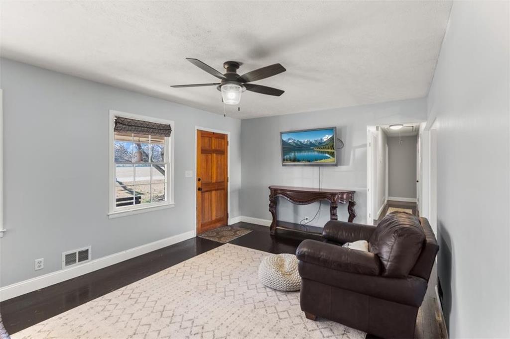213 Cook Street Cartersville, GA 30120 - Photo 5 of 45 a living room with furniture and a window