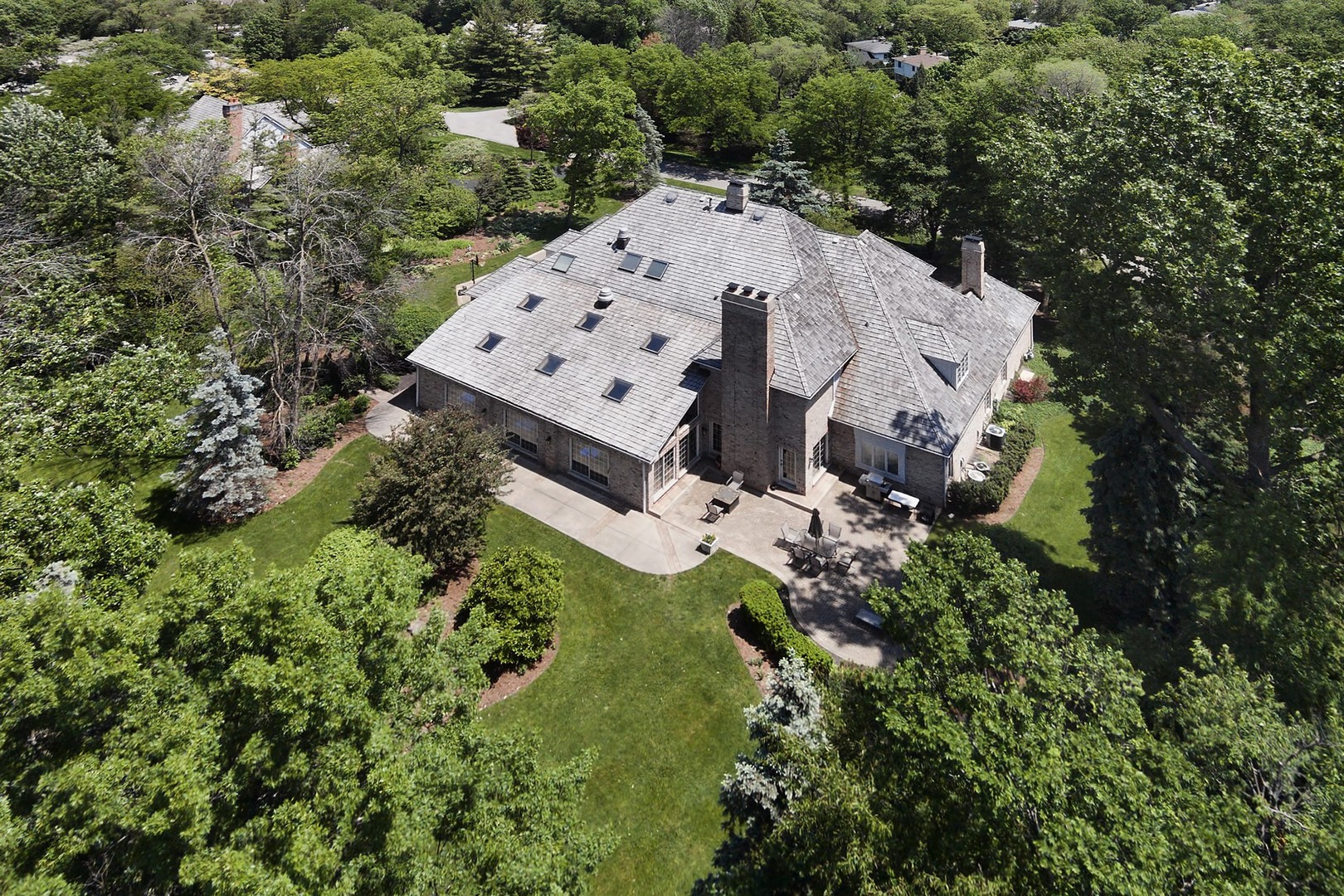4 Bristol Road Northfield, IL 60093 - Photo 2 of 22 an aerial view of a house with a yard
