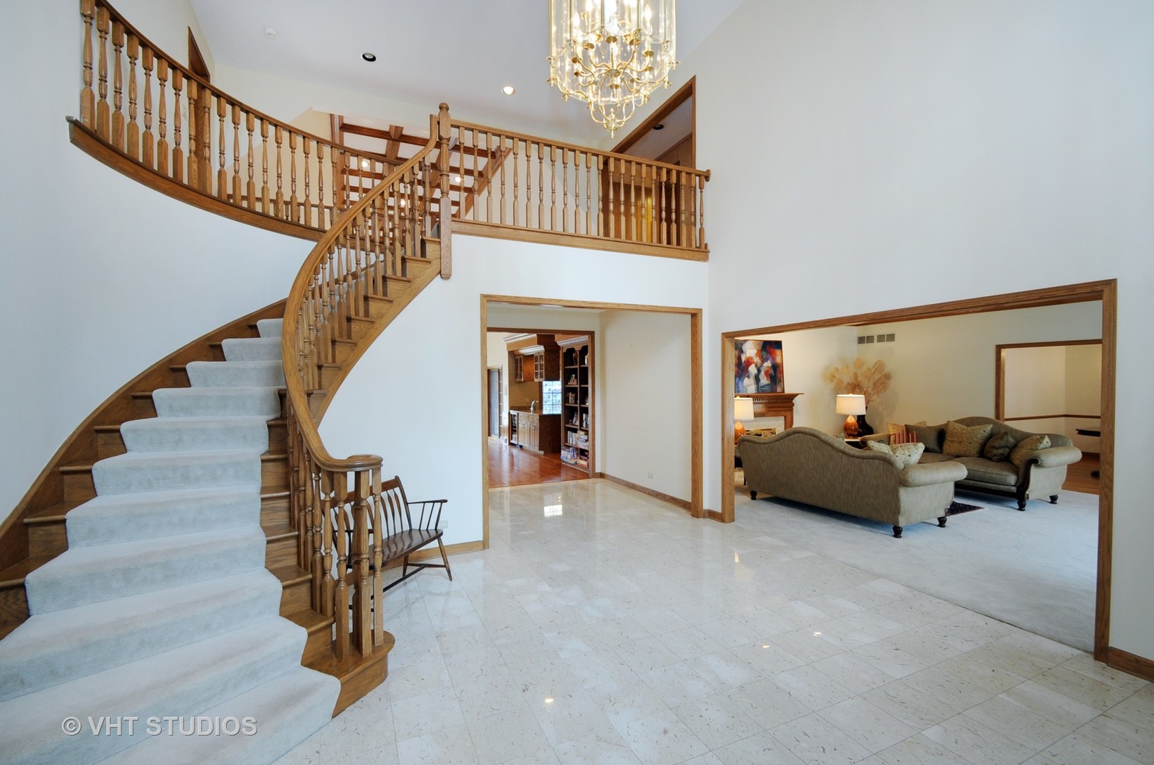 4 Bristol Road Northfield, IL 60093 - Photo 3 of 22 a living room with furniture and a chandelier
