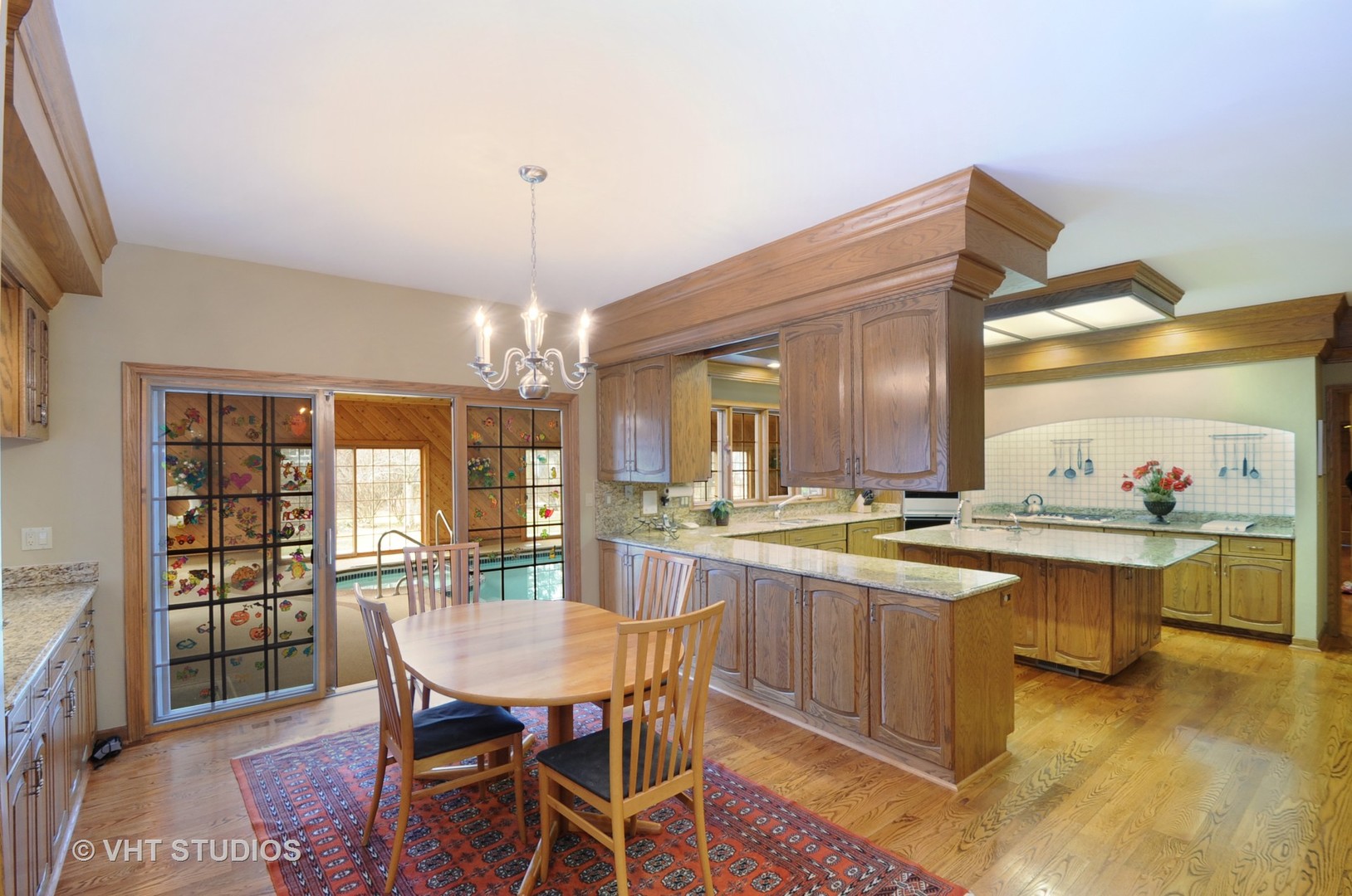 4 Bristol Road Northfield, IL 60093 - Photo 8 of 22 a view of a dining room with furniture window and wooden floor