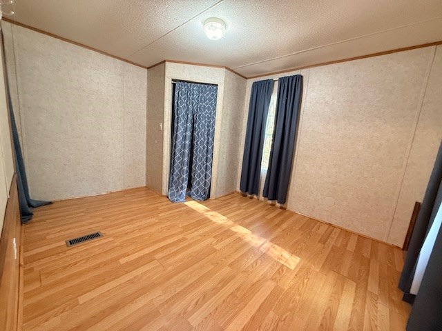193 Mt Pisgah Drive Ellijay, GA 30540 - Photo 9 of 13 a view of empty room with wooden floor