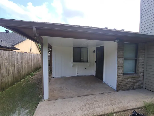 a view of a house with a garden