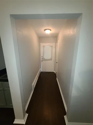 a stove top oven sitting inside of a kitchen
