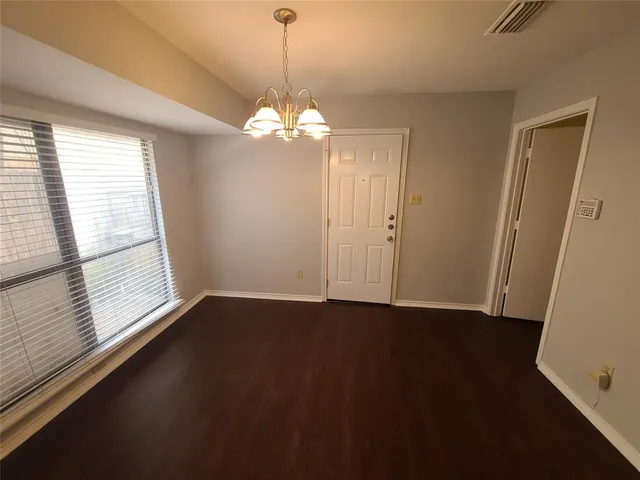 a kitchen with a sink and a stove