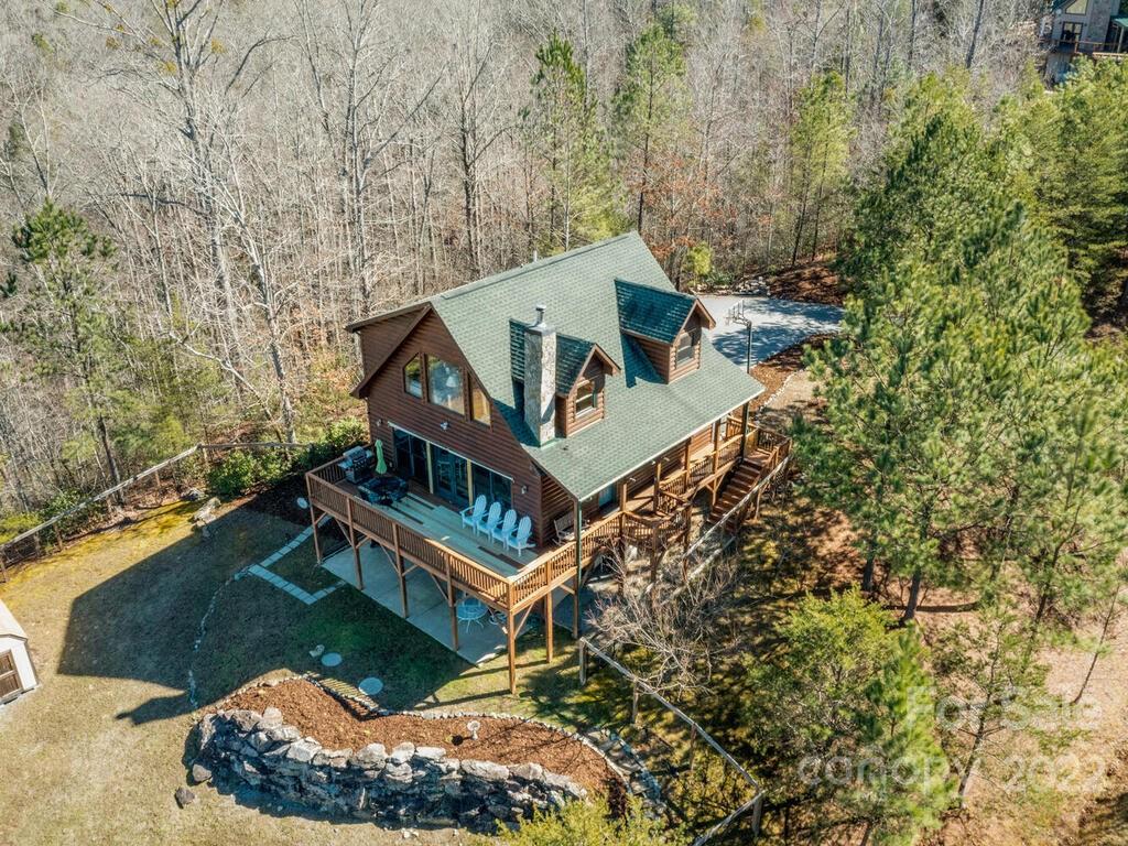 206 Legend Dr Mill Spring, Unit 8 Mill Spring, NC 28756 - Photo 45 of 47 aerial view of a house with a yard