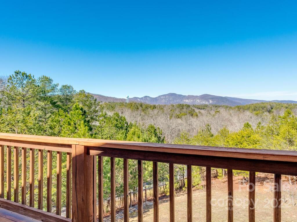 206 Legend Dr Mill Spring, Unit 8 Mill Spring, NC 28756 - Photo 9 of 47 a balcony with an outdoor space
