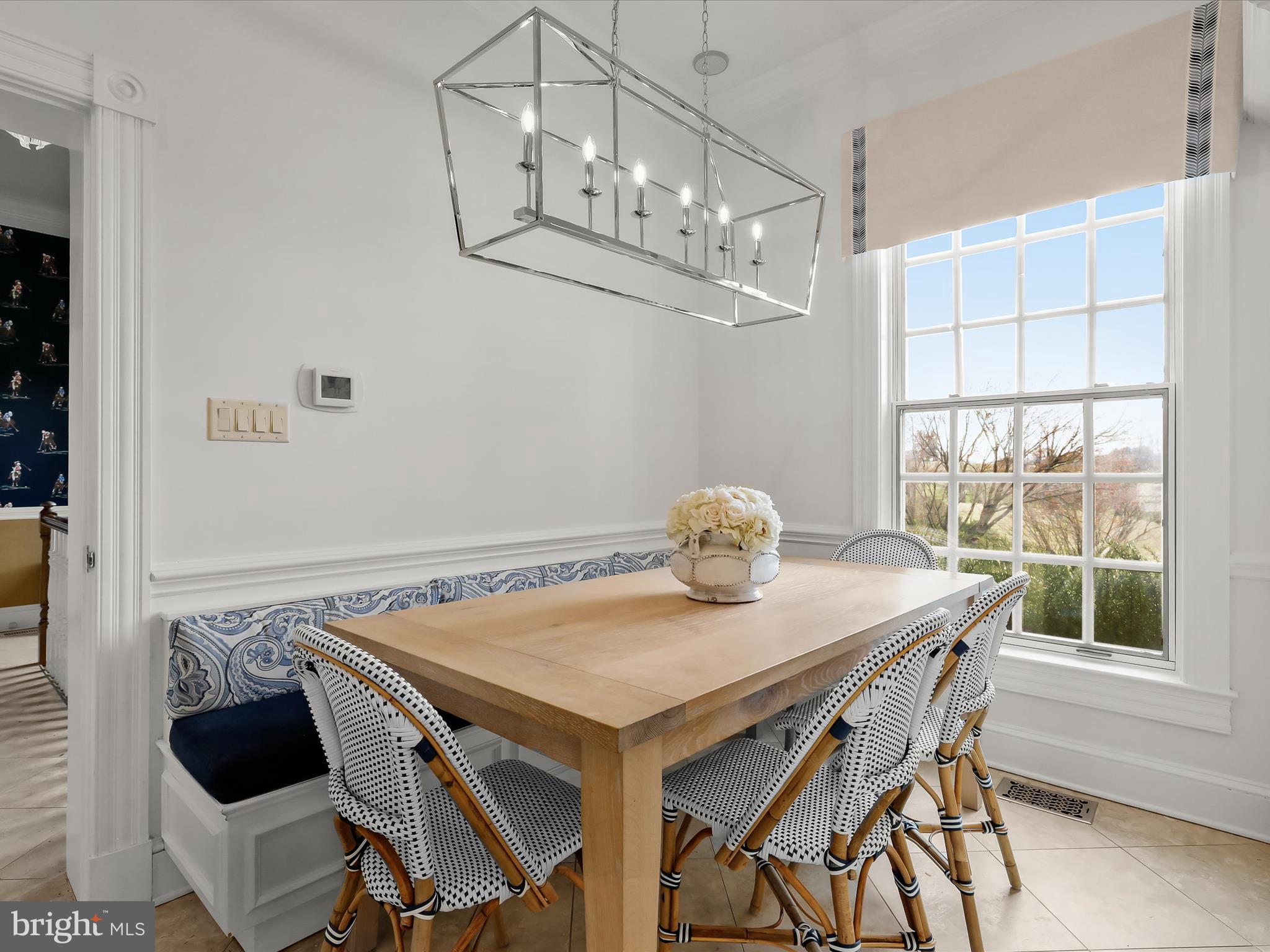 2612 Monkton Road Monkton, MD 21111 - Photo 20 of 81 a view of a dining room with furniture a chandelier and wooden floor