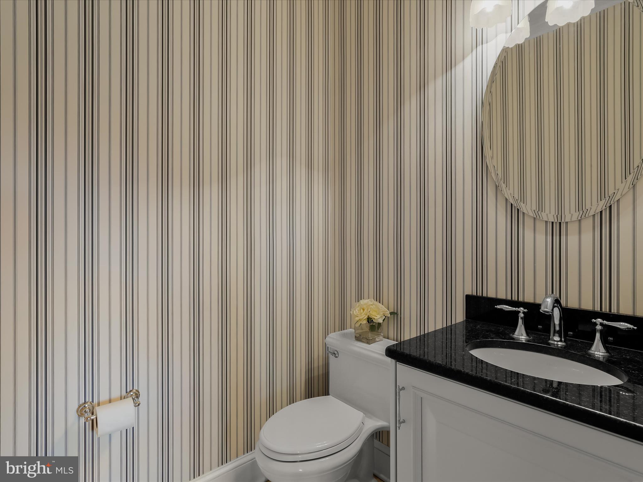 2612 Monkton Road Monkton, MD 21111 - Photo 22 of 81 a bathroom with a granite countertop sink and a toilet