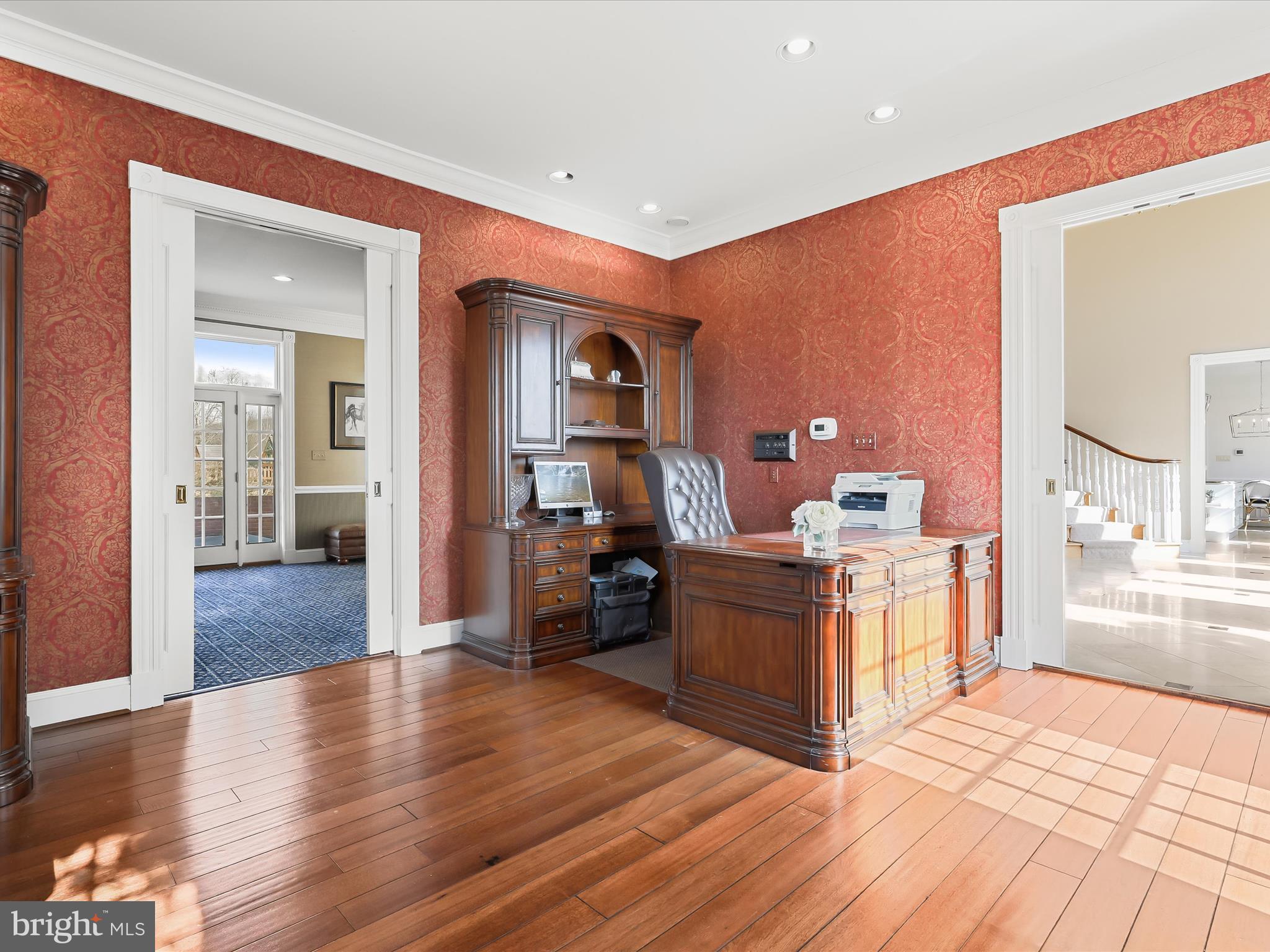 2612 Monkton Road Monkton, MD 21111 - Photo 29 of 81 a kitchen with stainless steel appliances kitchen island wooden floors and view living room