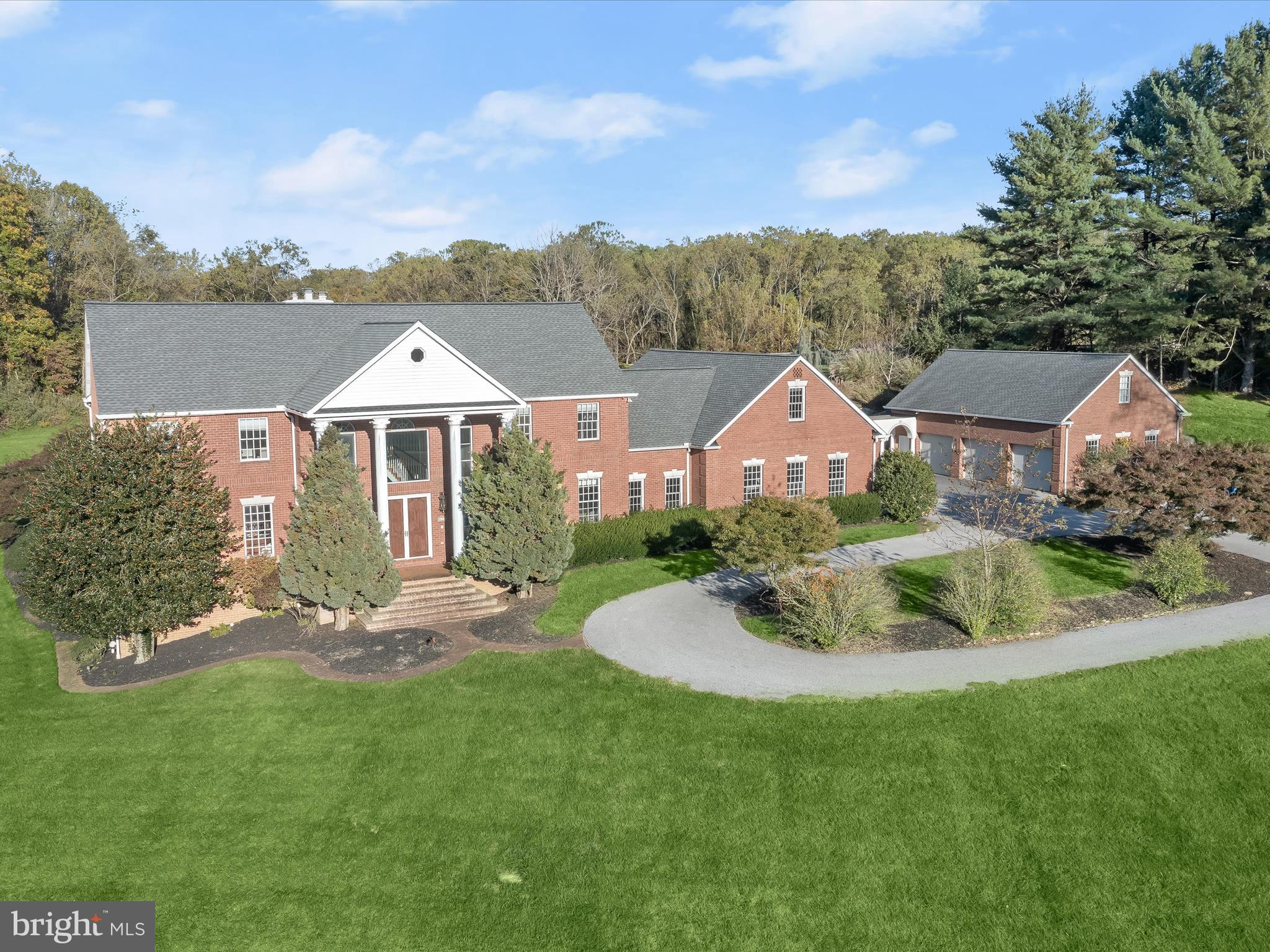 2612 Monkton Road Monkton, MD 21111 - Photo 3 of 81 a front view of a house with a garden