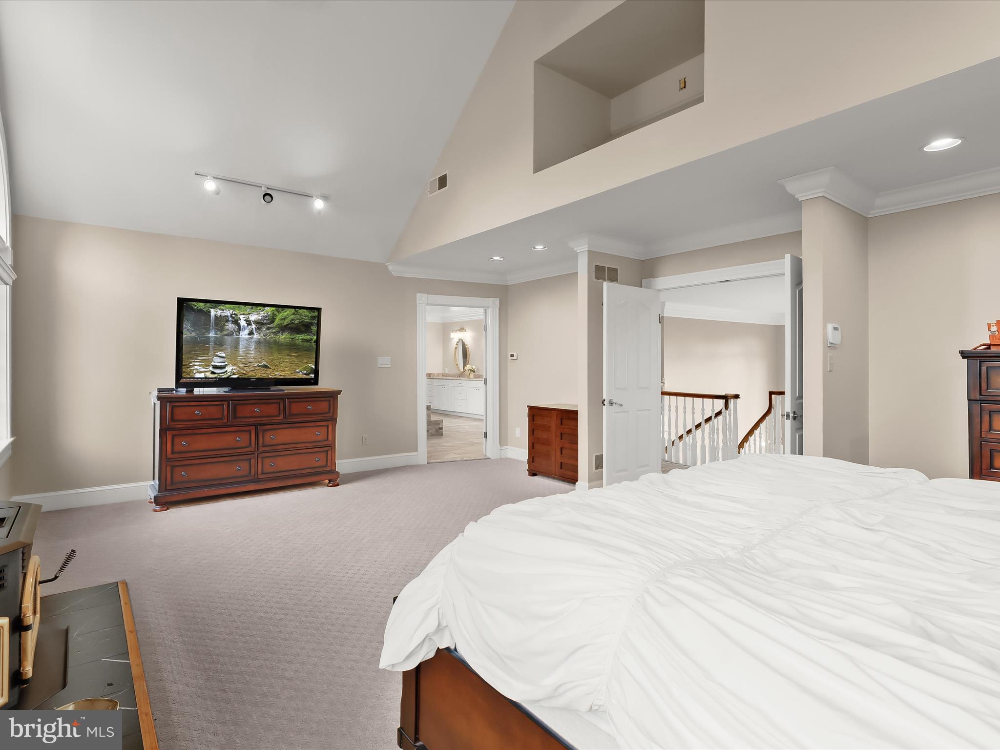 2612 Monkton Road Monkton, MD 21111 - Photo 33 of 81 a spacious bedroom with a bed and a flat screen television