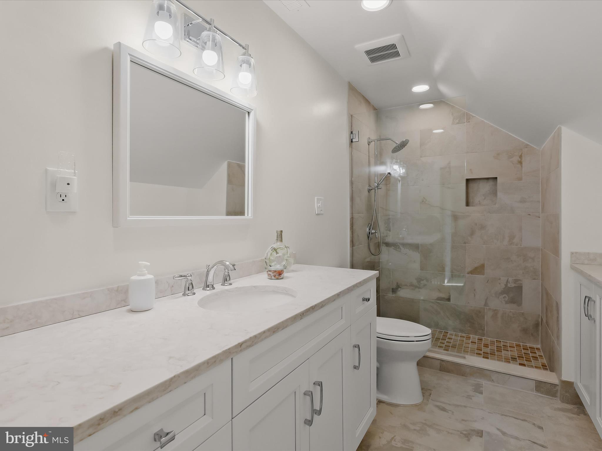 2612 Monkton Road Monkton, MD 21111 - Photo 42 of 81 a bathroom with a sink a toilet and shower