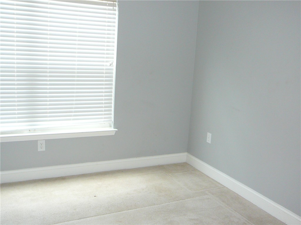 131 Lookover Drive Anderson, SC 29621 - Photo 8 of 18 Sun-filled room featuring plush carpeting and white window blinds for privacy.