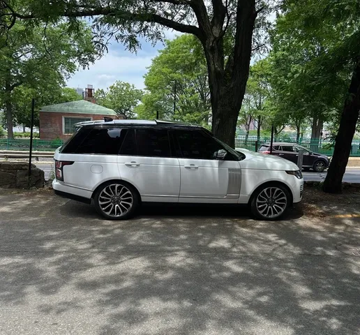 a view of a car parked in a yard