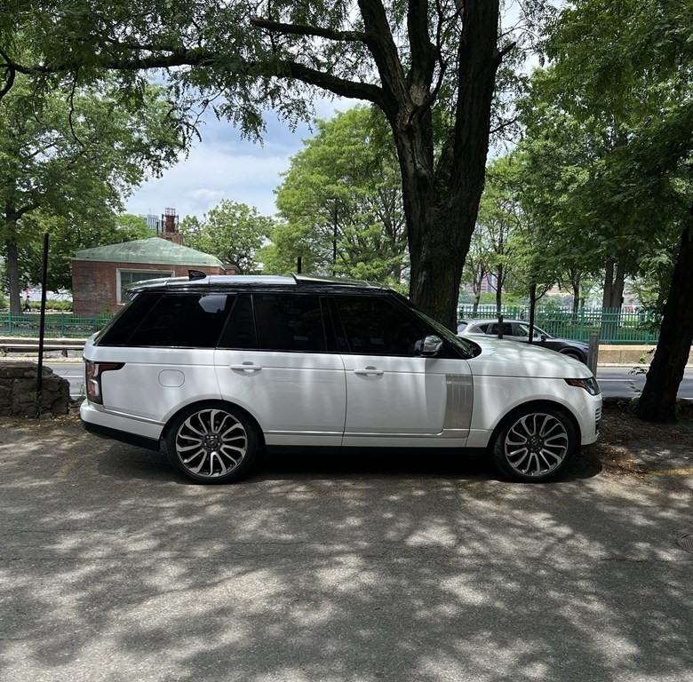 244 Beacon Street Boston, MA 02116 - Photo 3 of 4 a front view of a house with a garden