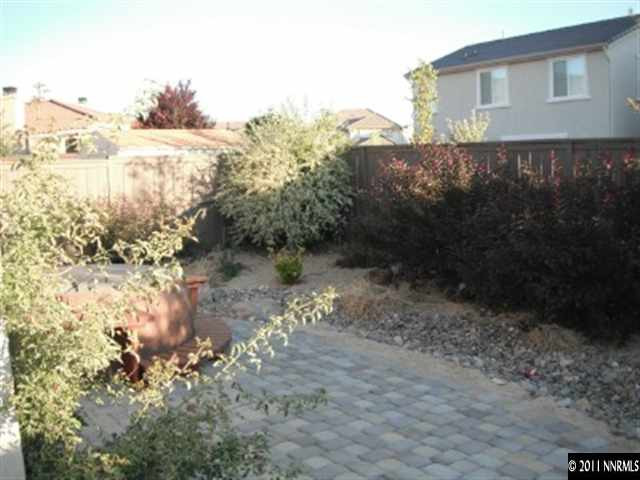 13755 Seabiscuit Drive Reno, NV 89521 - Photo 11 of 12 a view of a lake with mountains in the background