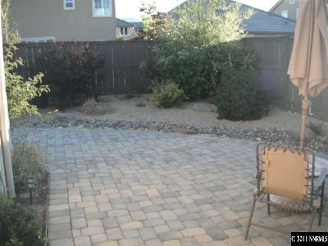 13755 Seabiscuit Drive Reno, NV 89521 - Photo 12 of 12 a backyard of a house