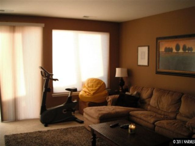 13755 Seabiscuit Drive Reno, NV 89521 - Photo 6 of 12 a living room with furniture and a window