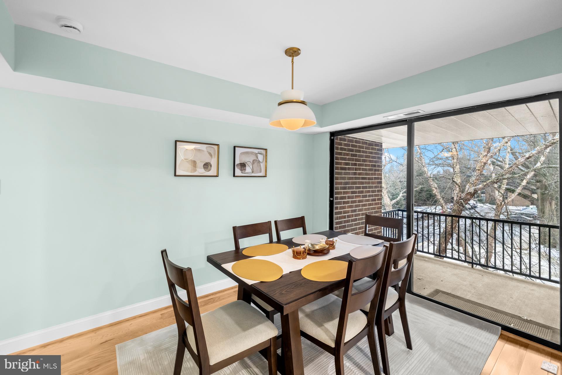 9820 Georgia Avenue, Unit 21302 Silver Spring, MD 20902 - Photo 11 of 24 Bright dining space with serene views.