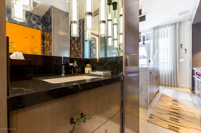 a front view of a house with grey walls