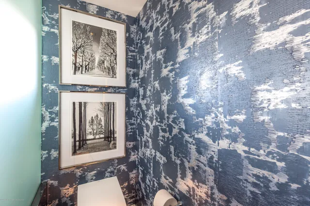 a view of living room with furniture and a window