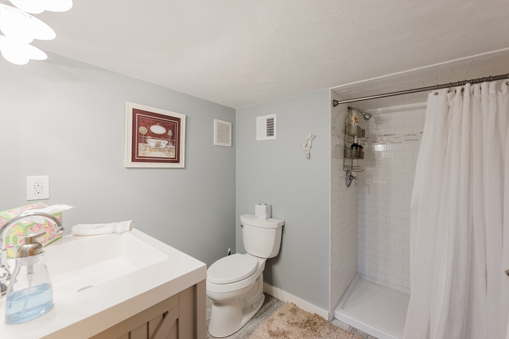 4 Ross Avenue Wareham, MA 02571 - Photo 38 of 39 a bathroom with a sink a toilet and shower
