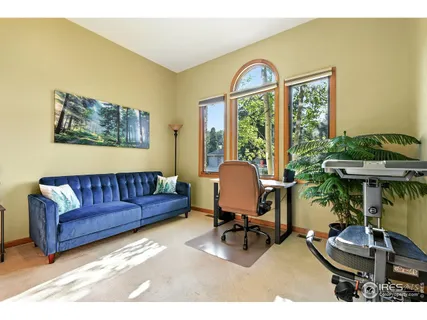 a large bathroom with a double vanity sink a mirror and a bathtub