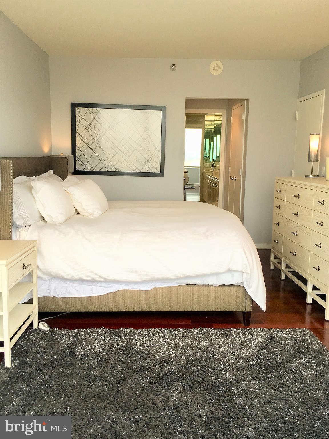 202-210 West Rittenhouse Square, Unit 2402 Philadelphia, PA 19103 - Photo 14 of 20 Master Suite w/ King Bed and reading nook