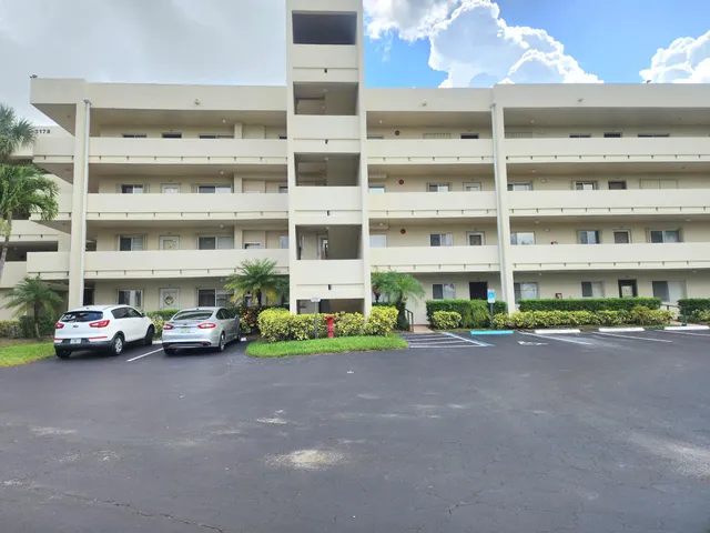 a cars parked in front of a building
