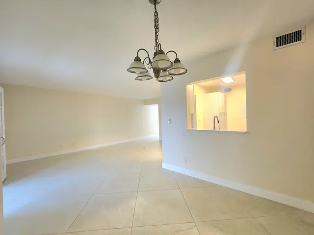 a view of a room with a chandelier