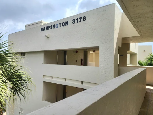 a view of a kitchen with a fridge