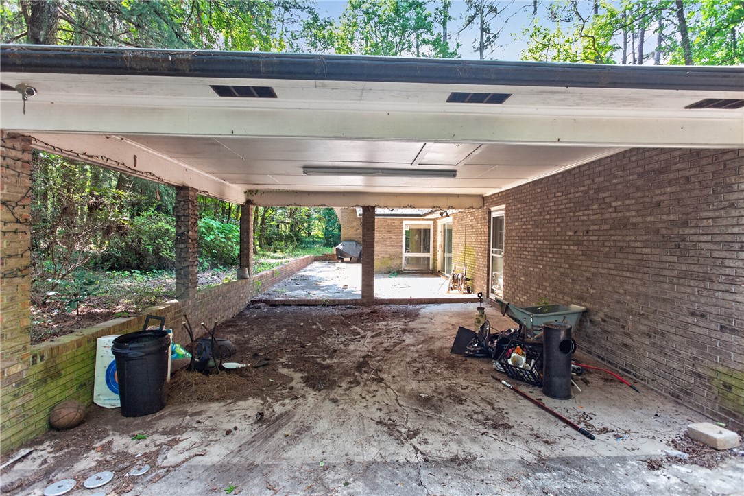 123 Robin Road Westminster, SC 29693 - Photo 9 of 50 A spacious, brick-columned carport provides ample sheltered parking and direct access to the home.