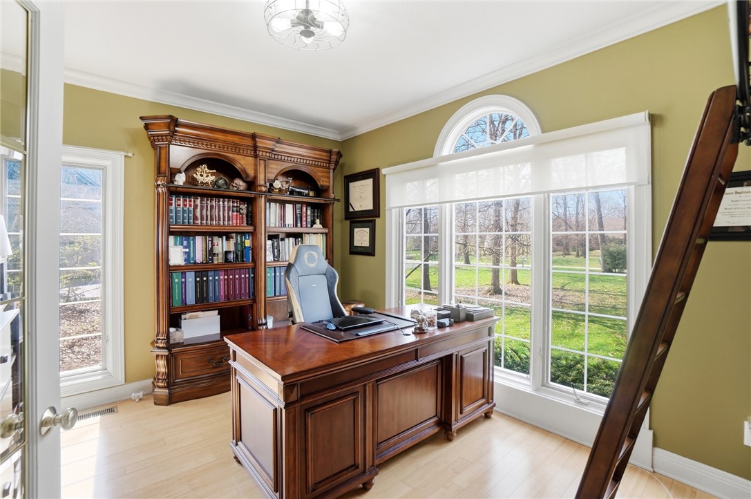 472 Timber Walk Court Springboro, OH 45066 - Photo 17 of 86 This bright office offers serene views and custom built-in cabinetry, perfect for productivity.